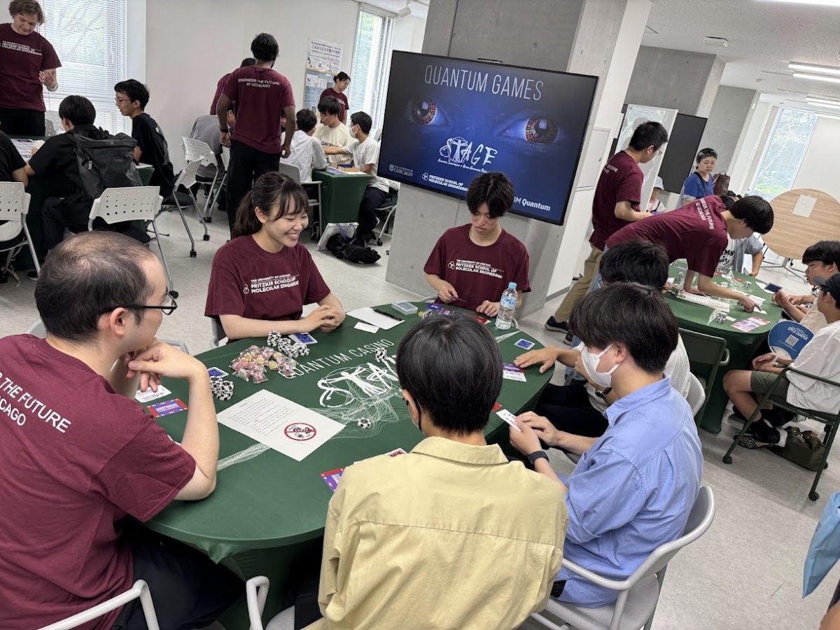 Visitors and student facilitators playing Quantum Games during Tohoku University Open Campus 2026